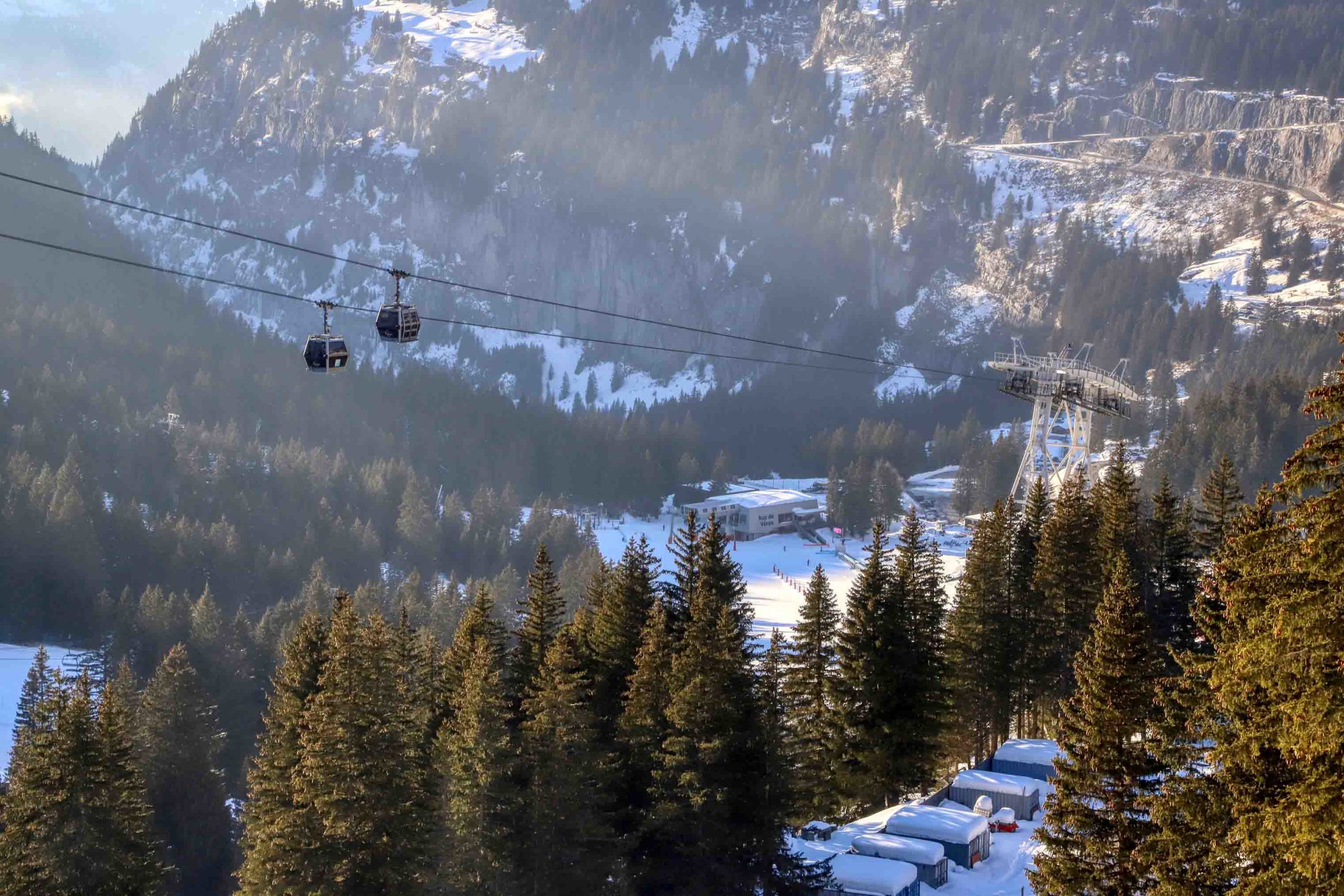 Winter landscape with two cabins of the Grandes Platières cable car